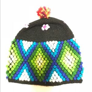 Green and black alpaca winter hat